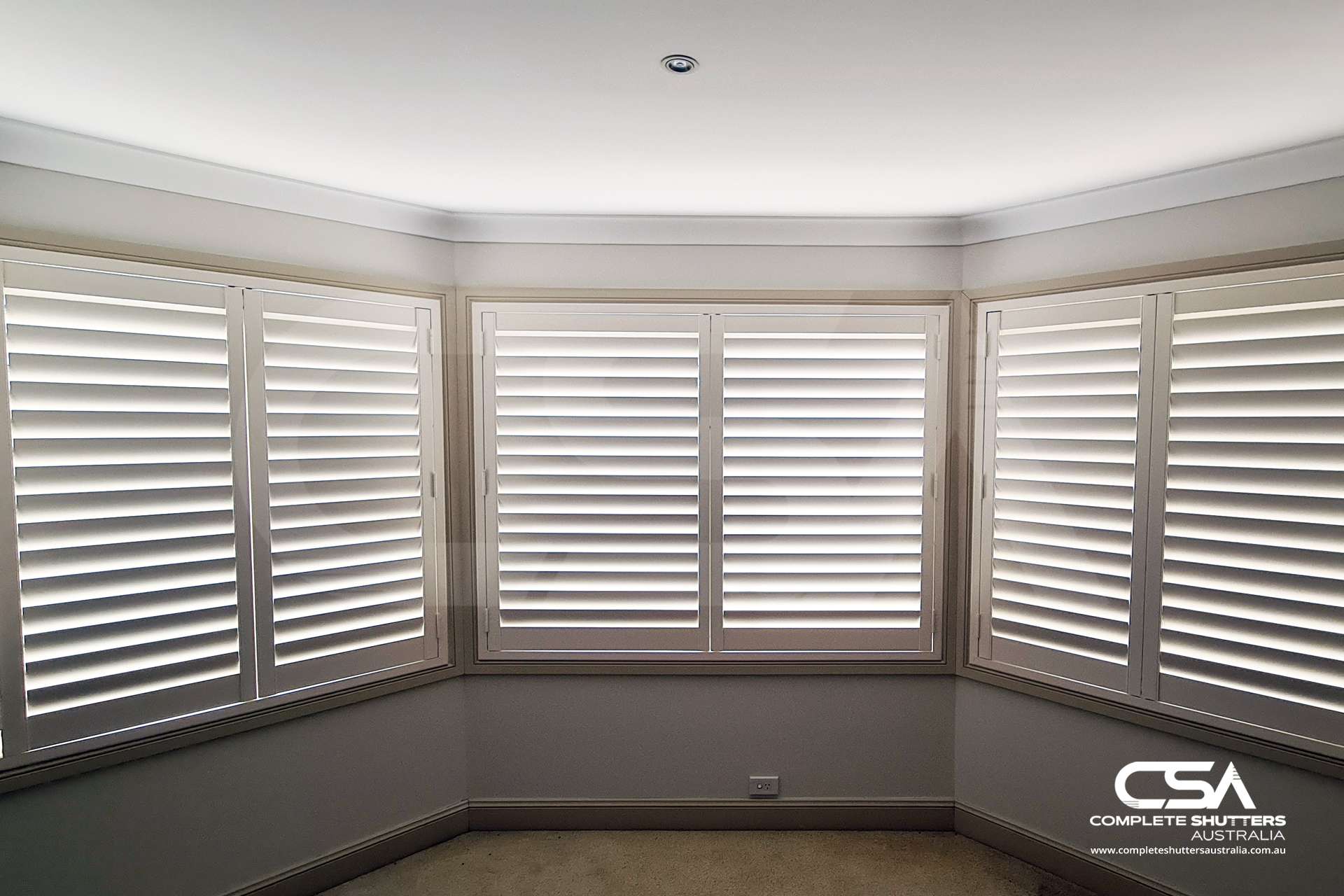Complete Shutters Bay Windows with White Shutters